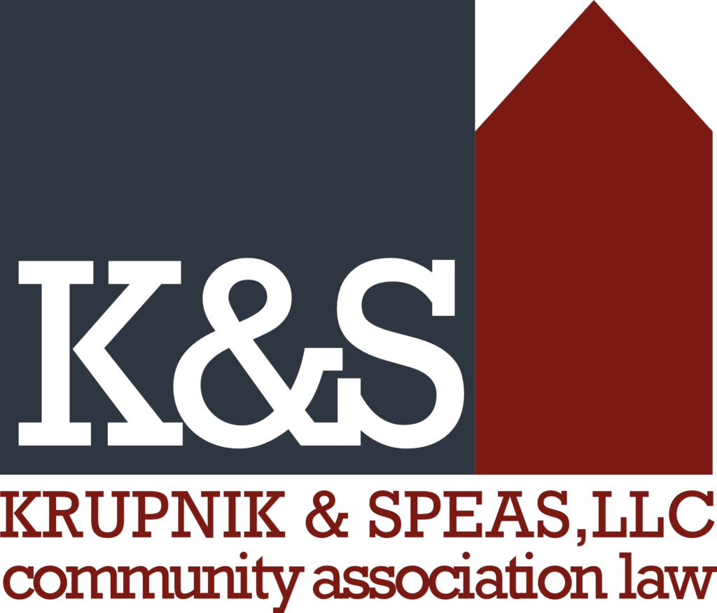 Dark blue square block next to a dark red square block with a white K & S within the blue block. Underneath says Krupnik & Speas, LLC, community association law in the dark red color.